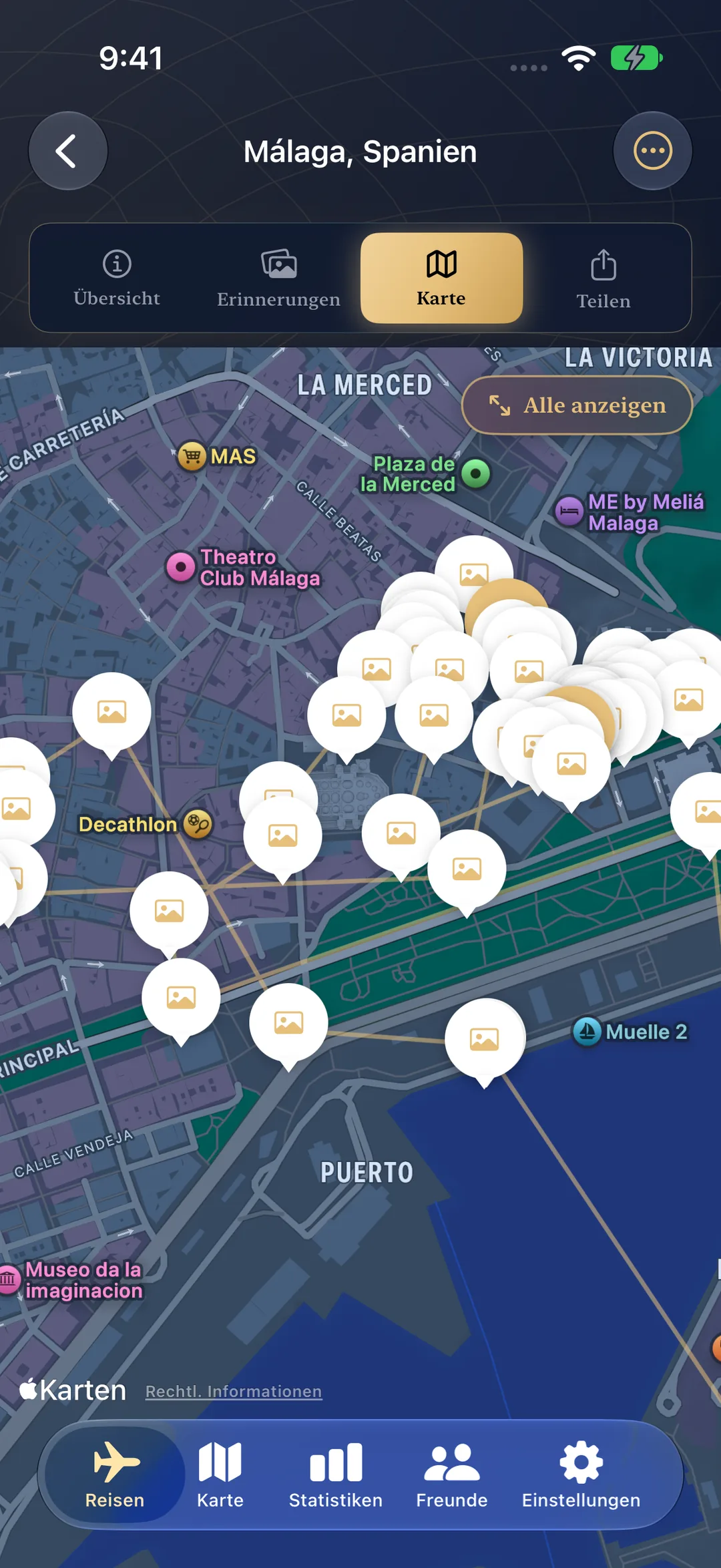 Reisekarte für Málaga mit Foto-Memory-Pins entlang der Straßen, die Sie entlang gegangen sind